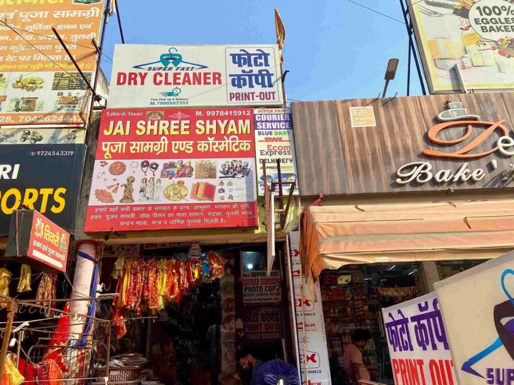 "Exterior view of Super Fast Drycleaners shop in Gurgaon, The shop provides dry-cleaning, services in a huda marketplace."
